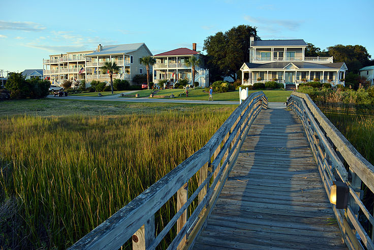 A view of riverfront homes from the Marsh Walk in Southport, NC